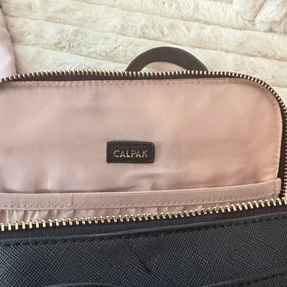 Calpak Black Backpack with Gold Accents